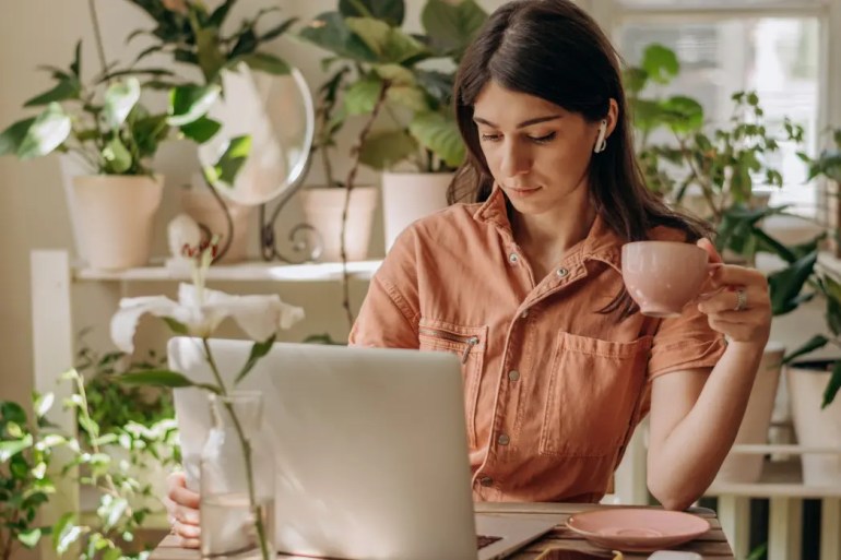 Girl working on Pinterest habits on computer