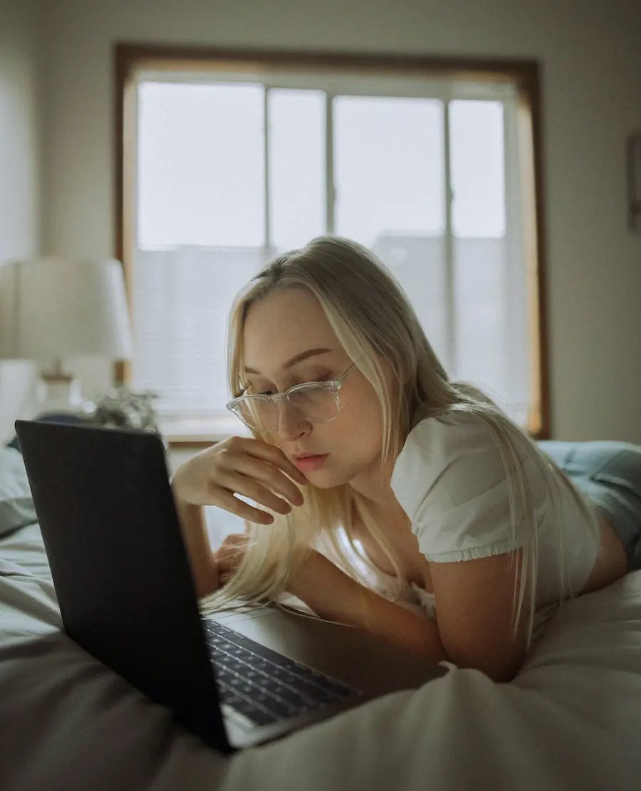 girl doing a blog audit on her computer