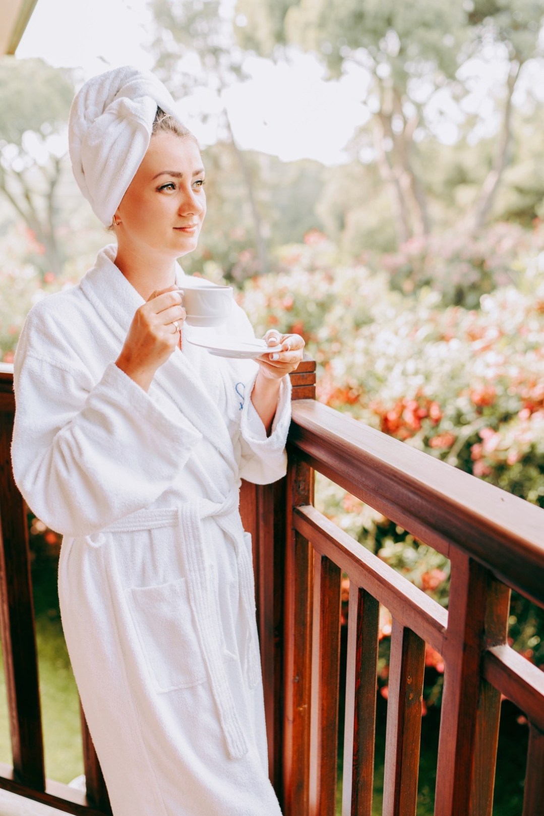 woman in robe for her self care retreat